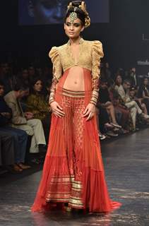 Model displays designer Neeta Lulla's creation during the Lakme Fashion Week Day 4 in Mumbai. .