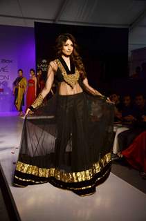 Models display creations by designer Shama Sikander during Lakme Fashion Week Day 4 in Mumbai. .