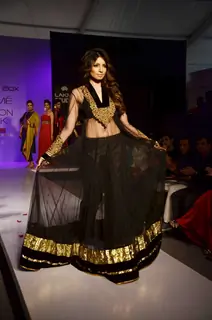 Models display creations by designer Shama Sikander during Lakme Fashion Week Day 4 in Mumbai. .
