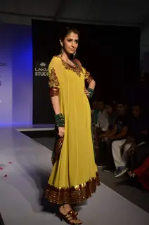 Models display creations by designer Shama Sikander during Lakme Fashion Week Day 4 in Mumbai. .