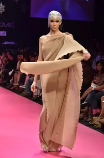 Model displays designer Wendell Rodricks's creation during the Lakme Fashion Week Day 4 in Mumbai. .