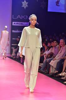 Model displays designer Wendell Rodricks's creation during the Lakme Fashion Week Day 4 in Mumbai. .