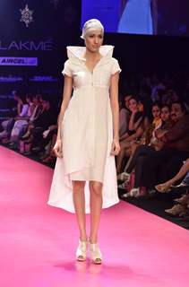 Model displays designer Wendell Rodricks's creation during the Lakme Fashion Week Day 4 in Mumbai. .