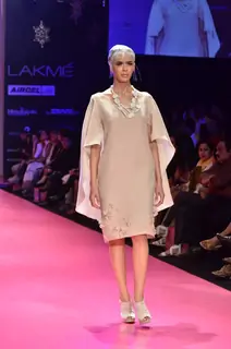Model displays designer Wendell Rodricks's creation during the Lakme Fashion Week Day 4 in Mumbai. .