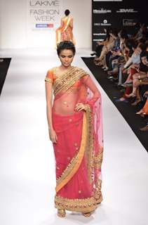 Model displays designer Preeti S. Kapoor's creation during the Lakme Fashion Week Day 5 in Mumbai. .