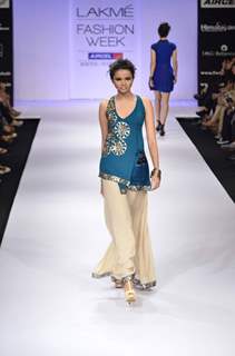 Model displays designer Nandita Thirani's creation during the Lakme Fashion Week Day 5 in Mumbai. .