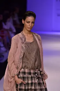 Model displays designer Kallol Datta's creation during the Lakme Fashion Week Day 5 in Mumbai. .