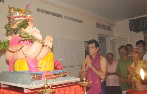 Jeetendra paying devote to Lord Ganesha during the occasion of Ganesh Chaturthi at their home