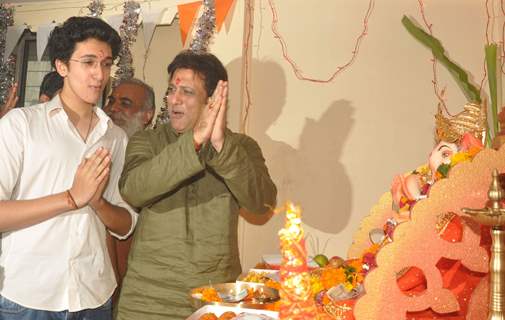 Govinda paying devote to Lord Ganesha during the occasion of Ganesh Chaturthi at their home