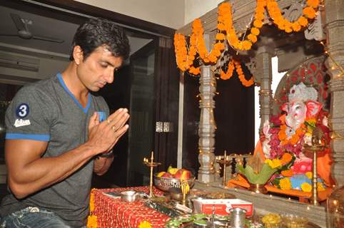 Sonu Sood paying devote to Lord Ganesha during the occasion of Ganesh Chaturthi at their home