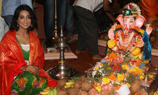 Mahie Gill paying devote to Lord Ganesha during the occasion of Ganesh Chaturthi at their home