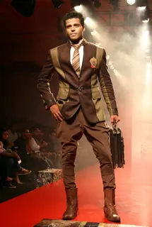 A model showcasing designer Arjun Khanna's creation at the Ven Heusen India Mens Week 2011, in New Delhi on Friday. .