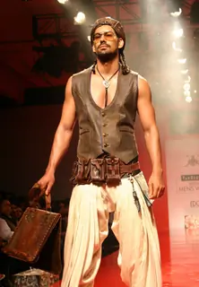 A model showcasing designer Arjun Khanna's creation at the Ven Heusen India Mens Week 2011, in New Delhi on Friday. .