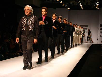 Models showcasing designer Manoviraj Khosla,s creations at the Van Heusen India Fashion Week,in New Delhi. .