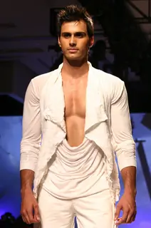 A model during designers Karan Johar and Varun Bahl's show  at the Van Heusen India Mens Week,in New Delhi on Sunday. .