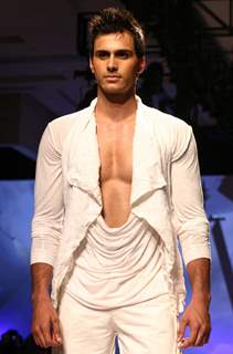 A model during designers Karan Johar and Varun Bahl's show  at the Van Heusen India Mens Week,in New Delhi on Sunday. .