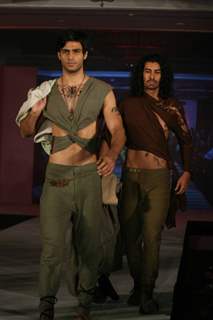 Model walks the ramp for WLC Chimera fashion show at Leela Hotel