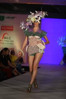 Model walks the ramp for WLC Chimera fashion show at Leela Hotel