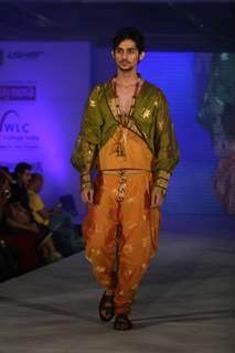 Model walks the ramp for WLC Chimera fashion show at Leela Hotel