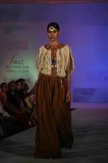 Model walks the ramp for WLC Chimera fashion show at Leela Hotel