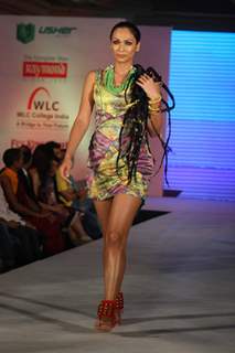 Model walks the ramp for WLC Chimera fashion show at Leela Hotel