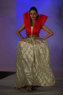 Model walks the ramp for WLC Chimera fashion show at Leela Hotel