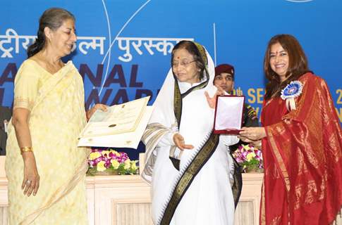 President Pratibha Devisingh Patil and Union Minister Ambika Soni  presenting the ''Best Palyback Singer Award'' to  Rekha Vishal Bhardwaj for  film ''Ishqiya