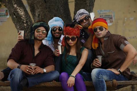 Karan Kundra with his co-stars in a poster still for the movie Pure Punjabi