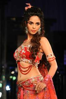 Mallika Sherawat walks the ramp for Anjalee and Arjun Kapoor at Aamby Valley City India Bridal Week 2011 Day 1 at Saharastar, Mumbai