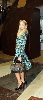 Paris Hilton showcases her line of handbags and accessories at Shoppers Stop at Inorbit Mall in Malad, Mumbai