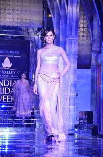 Model walks the ramp for Tarun Tahiliani show at Aamby Valley Fashion week. .