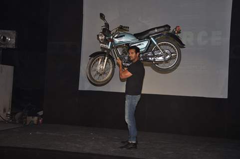 John Abraham lifts a bike at Force promotions in Mehboob, Mumbai