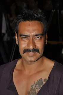 Ajay Devgan felicitated by Ex Mithibai College association headed by Krishna Hegde