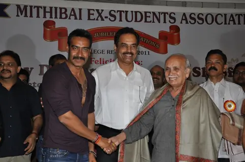 Ajay Devgan felicitated by Ex Mithibai College association headed by Krishna Hegde