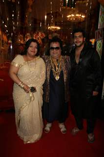 Bappi Lahiri with wife and son at Sarbojanin Durga Puja Pandal in Mumbai