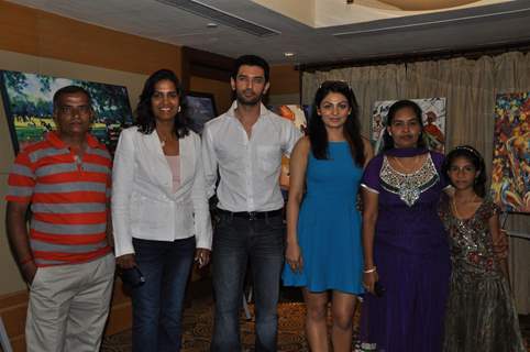 Chirag Paswan & Neeru Bajwa poses during an Art Exhibition at Vivanta by Taj in Mumbai