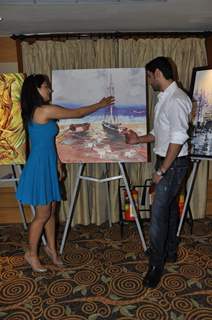 Chirag Paswan & Neeru Bajwa poses during an Art Exhibition at Vivanta by Taj in Mumbai