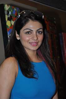 Neeru Bajwa poses during an Art Exhibition at Vivanta by Taj in Mumbai