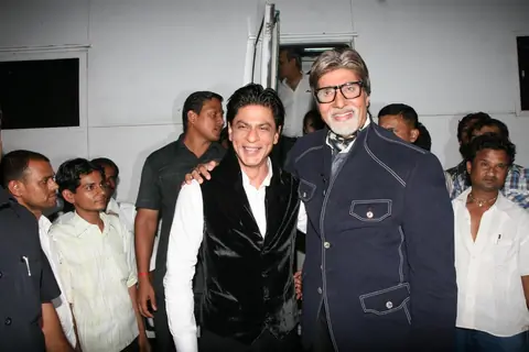 Amitabh Bachchan with Shah Rukh Khan on the sets of Kaun Banega Crorepati 5 in Mumbai