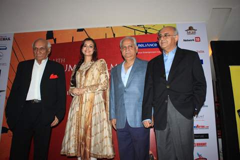 Dia Mirza with Yash Chopra igniting the auspicious lamp in 13th Mumbai Film Festival opening ceremony at Cinemax in Mumbai