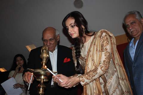 Dia Mirza with Yash Chopra igniting the auspicious lamp in 13th Mumbai Film Festival opening ceremony at Cinemax in Mumbai