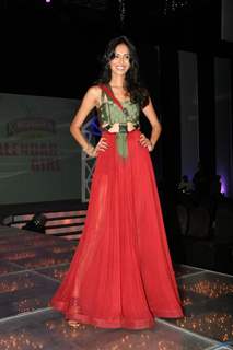 Model Ujjwala Raut walks the ramp at Kingfisher Calendar Girl 2011 contest in Mumbai