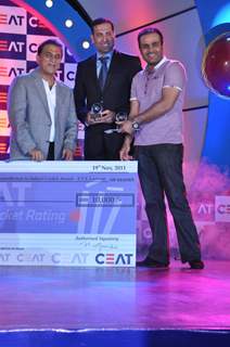 Sunil Gavaskar honoured Virender Sehwag and VVS Laxman at CEAT Cricket Rating Awards 2011 in Mumbai