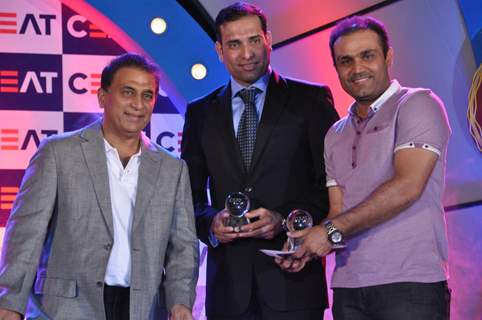 Sunil Gavaskar honoured Virender Sehwag and VVS Laxman at CEAT Cricket Rating Awards 2011 in Mumbai