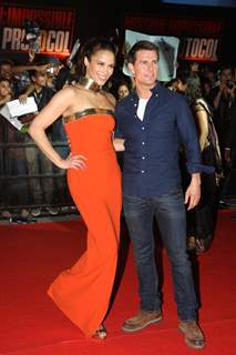 Tom Cruise and Paula Patton poses for a photo before a special screening of film Mission Impossible