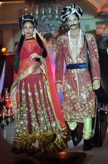 Models walk the ramp for designer Nisha Sagar Bridal Collection