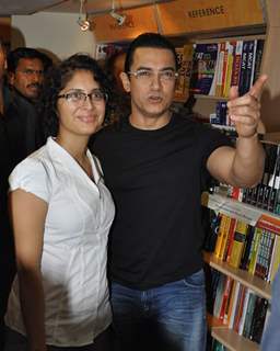 Aamir Khan with wife Kiran Rao launches DVD of their film DHOBI GHAT at the Crossword store in Mumbai