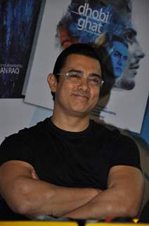 Aamir Khan launches DVD of their film DHOBI GHAT at the Crossword store in Mumbai