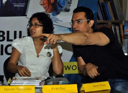 Aamir Khan with wife Kiran Rao launches DVD of their film DHOBI GHAT at the Crossword store in Mumbai