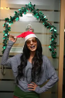 Veena Malik celebrating Christmas and posing with Christmas theme